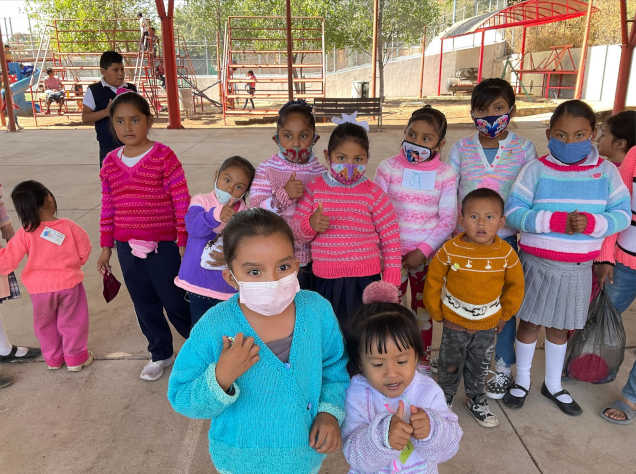 Happy children in their Needlepusher clothing.